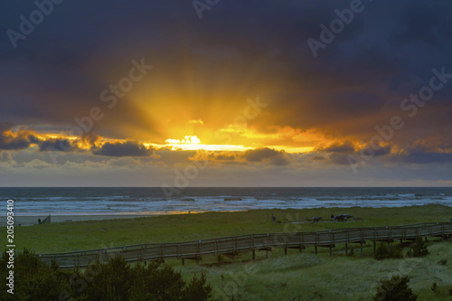 Sun Rays at Long Beach Washington during Sunset in the mouth of Columbia River Plakát