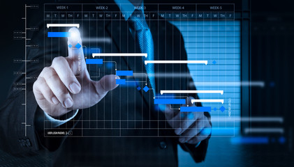 Wall Mural - businessman hand working with touch screen