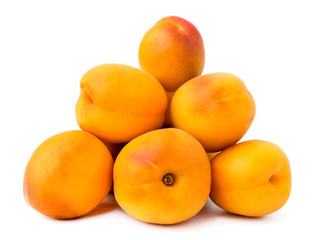 Wall Mural - A bunch of ripe apricots on a white, isolated.