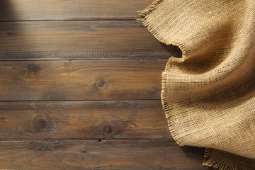 burlap hessian on wooden background