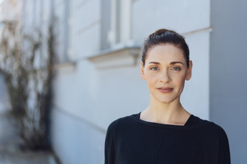 Attractive elegant woman with her hair in a bun