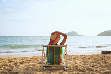 Wall Mural - Woman on beach in summer