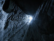 ansient dark stone cave whith letters inside view