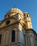 Fototapeta Big Ben - Afternoon sunlight illuminates the Chiesa di Santa Maria dei Miracoli, Venice, Italy
