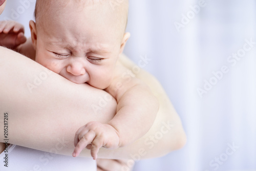 Fototapeta small crying baby