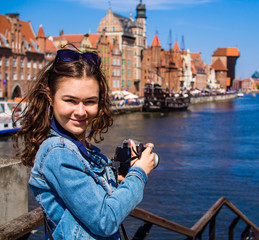 Young woman taking pictures 