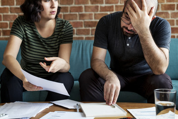 Couple managing the debt