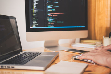 close up hand of developing programming and coding technologies. programmer hand typing on keyboard.