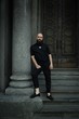 © smmartynenko - full length portrait of stylish handsome bearded man