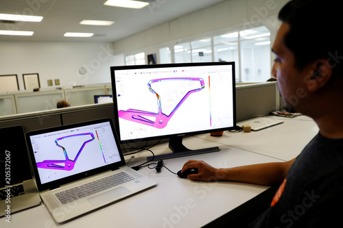 An Engineer Displays Finite Element Analysis Fea Of A 3d Printed