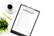 Blank checklist with space for ticks on pad on office desk. Checklist for office worker, manager, businessman, chief on white background top view space for text