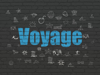 Wall Mural - Vacation concept: Painted blue text Voyage on Black Brick wall background with  Hand Drawn Vacation Icons