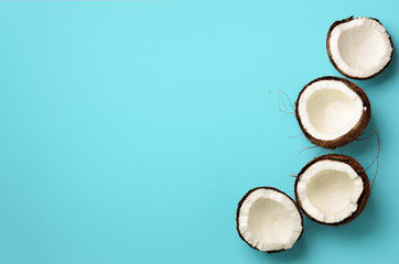 Wall Mural - pattern with ripe coconuts on blue background. top view. copy space. pop art design, creative summer