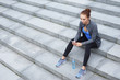 © Acronym - Young, fit and sporty woman. Fitness, sport, urban and healthy lifestyle concept.