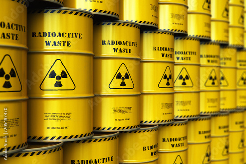 Fotografía Group of stacked yellow drums with radioactive waste