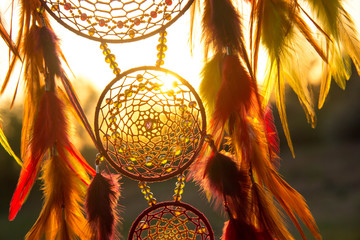 Wall Mural - Handmade dream catcher with feathers threads and beads rope hanging