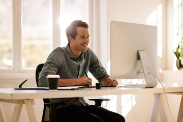 Entrepreneur working on computer at home