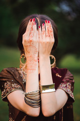 Sticker - Mehndi covers hands of Indian woman