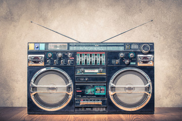 Wall Mural - retro design ghetto blaster stereo radio cassette tape recorders boombox from circa 80s front concre