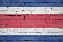 Costa Rica Flag Is Painted Onto An Old Brick Wall