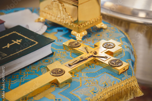 Cuadros en Lienzo Christening in the church, golden religious utensils: bible, cross, prayer book, missal