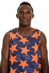 Young black African man wearing sleeveless shirt