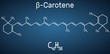 Beta Carotene, provitamin A, is an organic red-orange pigment in plants and fruits. Structural chemical formula and molecule model on the dark blue background