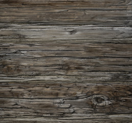 Wall Mural - Old Dark rough wood floor or surface with splinters and knots. Square background with flooring or boards with wood grain. Old aged timber in a barn or old house.