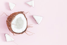 Coconut On Pastel Pink Background. Flat Lay, Top View, Close Up, Copy Space