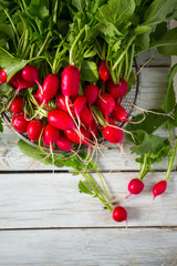 Wall Mural - fresh radishes on wooden surface