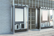 © peshkova - Modern glass shopfront with billboard