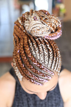 African Hairstyle Brady In Tail With Kanekalon On Girl's Head Close-up, Hair Texture