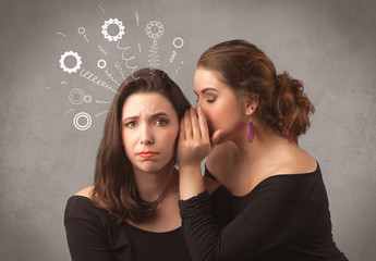 Wall Mural - Two girlfriends in elegant black dress sharing secrets with each other concept with drawn rack cog wheels and spiral lines on the wall background.