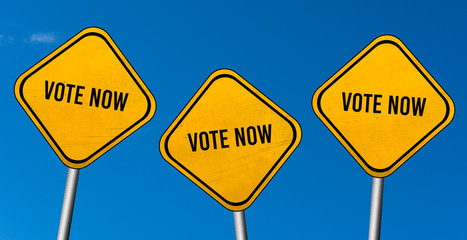 Wall Mural - vote now - yellow sign with blue sky