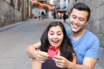 Wall Mural - Expressive girl surprised by her boyfriend