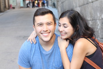 Wall Mural - Beautiful latino couple smiling close up