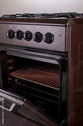 The Front Part Of The Modern Gas Stove With An Open Door Buy