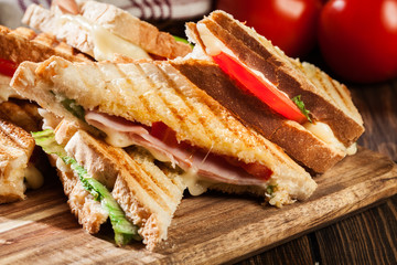 Poster - Stack of panini with ham, cheese and lettuce sandwich