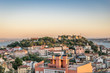 A panoramic view of the sunset over the Saint George Castle in Lisbon