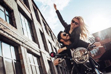 Romantic couple with motorcycle