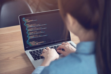 close up woman hands coding html and programming on screen laptop, development web, developer.