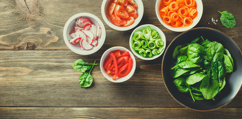 fresh vegetables in salad bowls