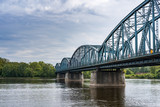 Fototapeta Most - Truss road bridge over Vistula river in Torun, Poland.