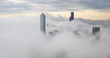 © blvdone - Chicago downtown buildings skyline thick fog cloud