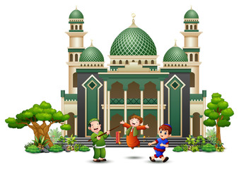 Wall Mural - Happy Muslim Kids playing firecracker in front of a mosque