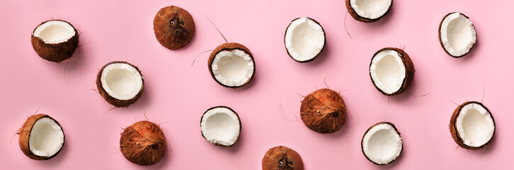 Wall Mural - pattern with ripe coconuts on pink background. top view. copy space. pop art design, creative summer