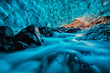 © Amedeo Iunco Photo - grotta di ghiaccio azzurro con ruscello sottostante Islanda Europa