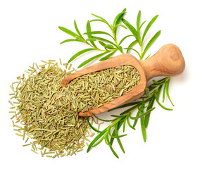 Poster - dried rosemary in the wooden scoop, isolated on white, top view