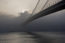 Bridge Hidden In The Fog At Sunrise