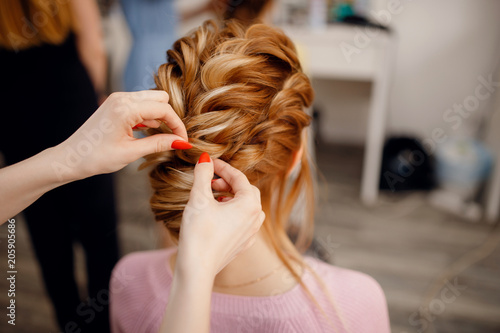 Hairdresser Woman Conducts Training For Pupil In Salon Weaving